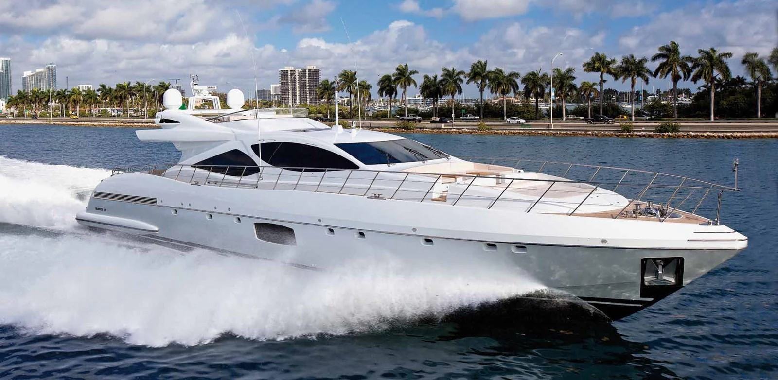 a white yacht on water aboard AXTANA Yacht for Sale