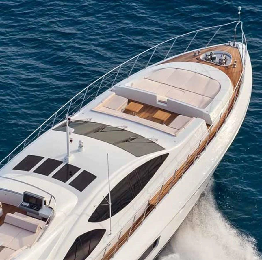 a white boat in the water aboard AXTANA Yacht for Sale