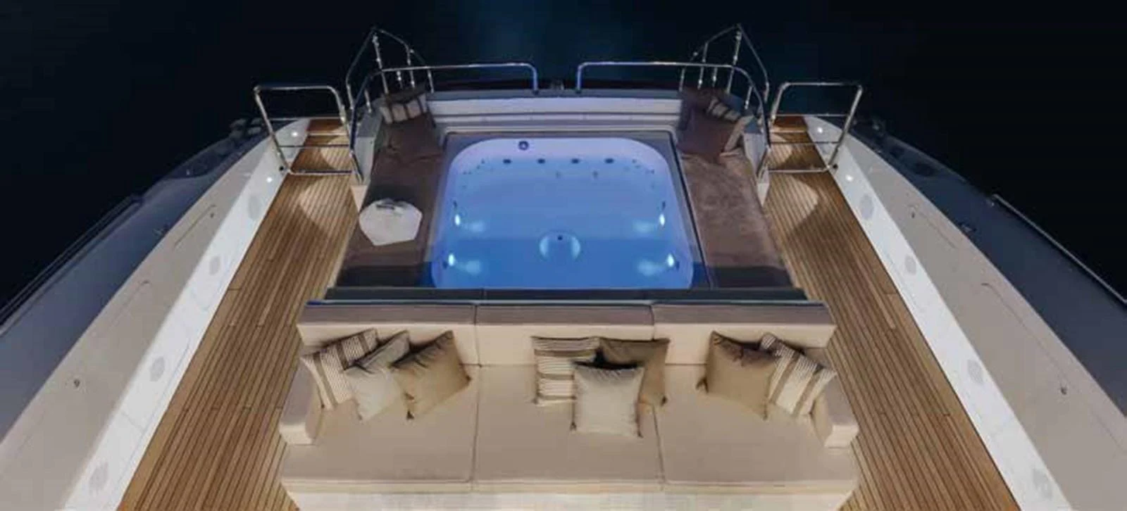 a rectangular pool with a slide aboard AXTANA Yacht for Sale