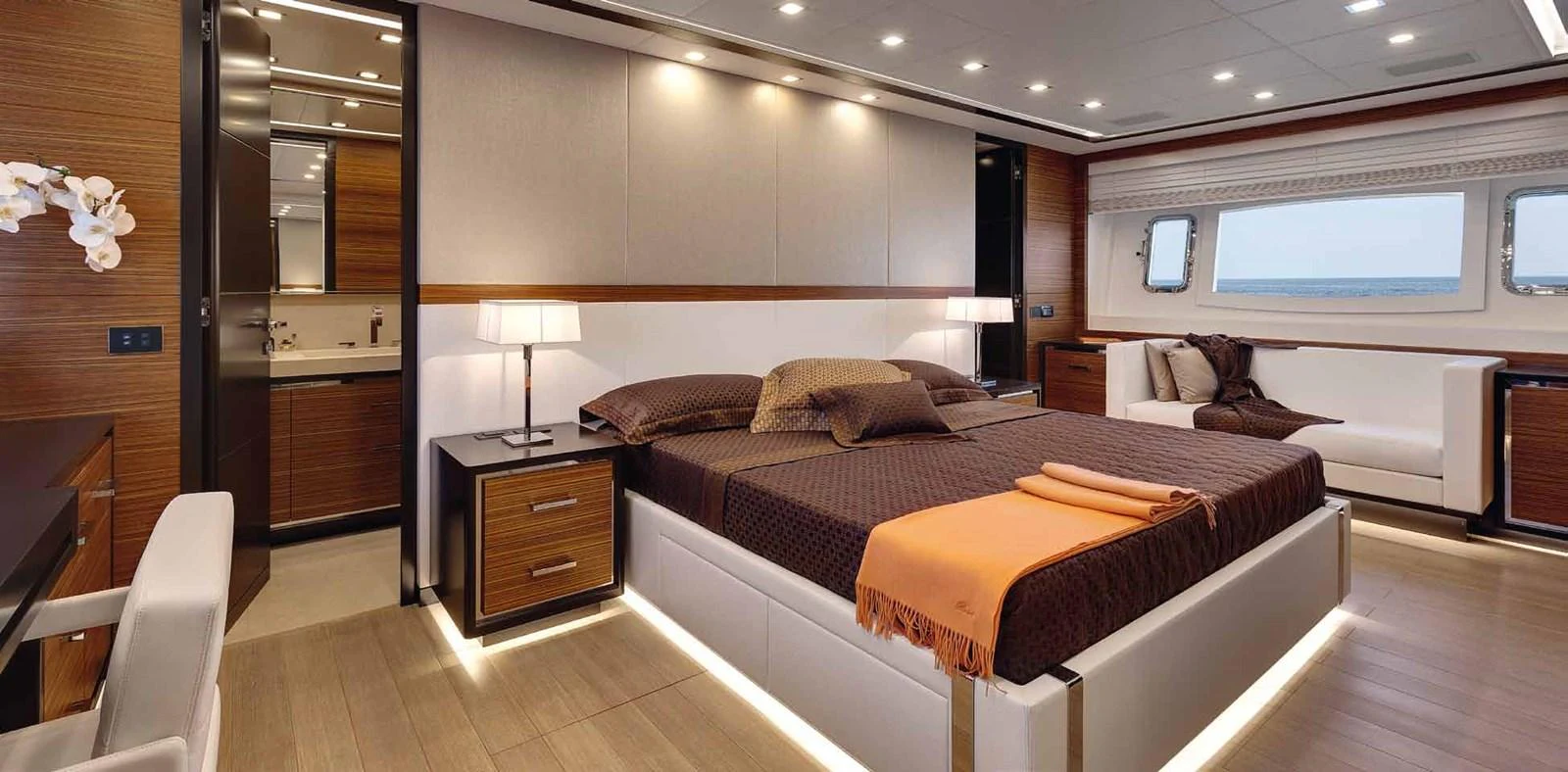 a hotel room with a bed and a tv aboard AXTANA Yacht for Sale