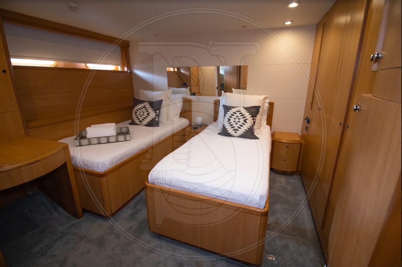 a couple of beds in a room aboard ANGELE Yacht for Sale