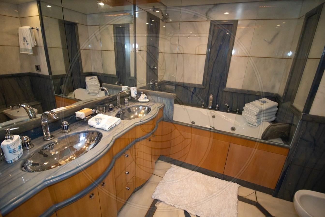a bathroom with a large countertop aboard ANGELE Yacht for Sale