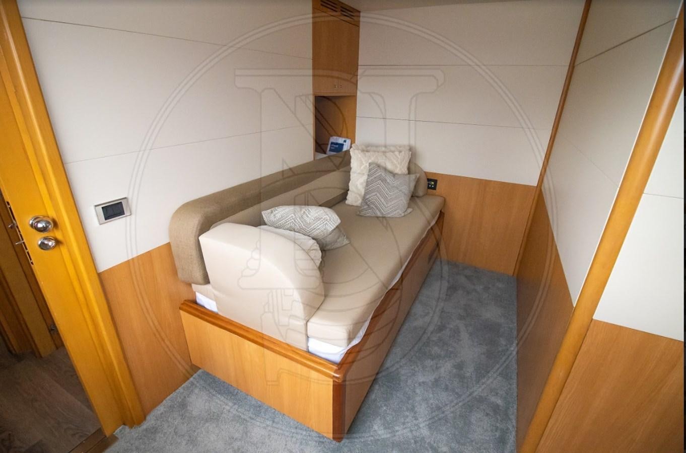 a bed in a room aboard ANGELE Yacht for Sale