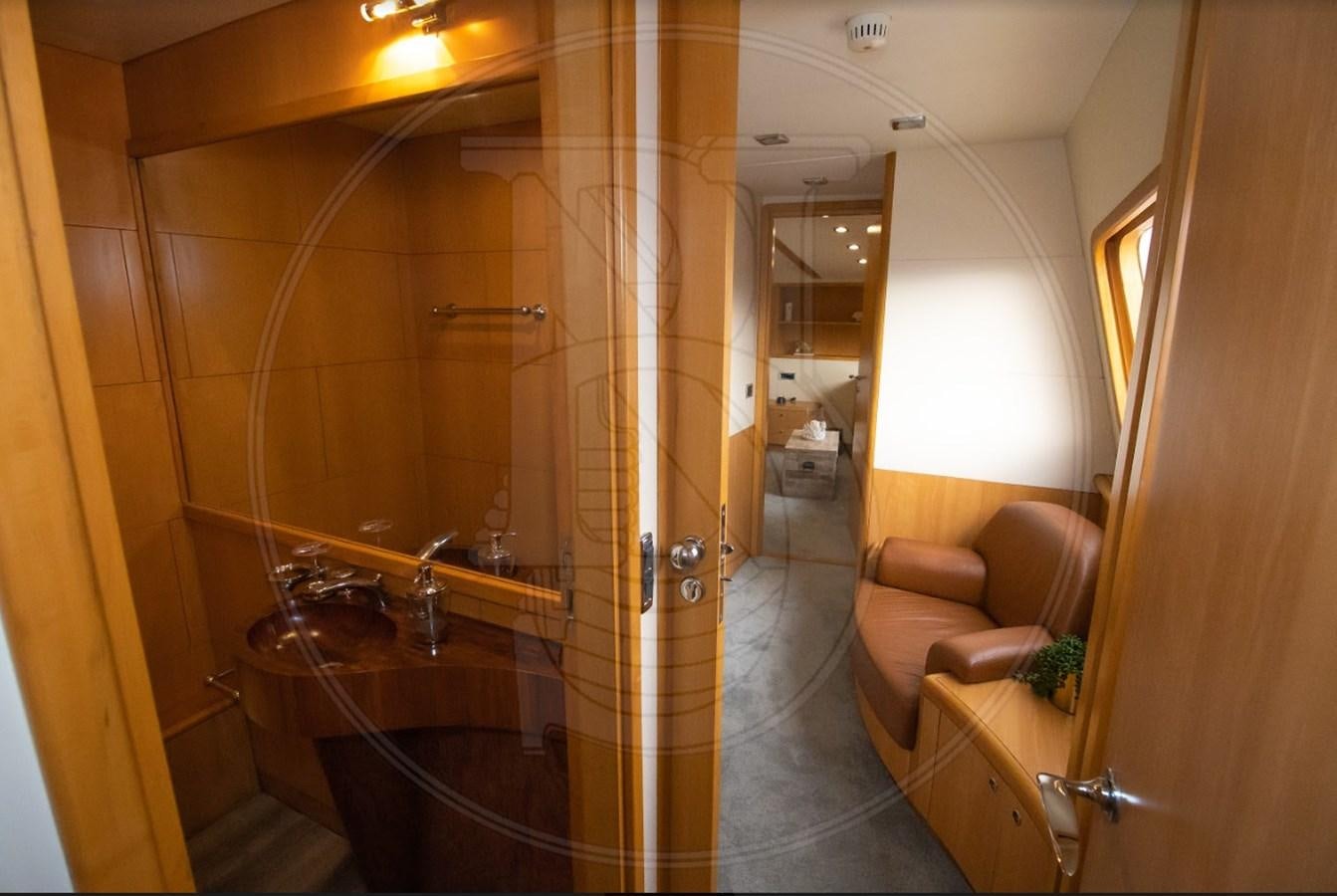 a bathroom with a glass shower aboard ANGELE Yacht for Sale