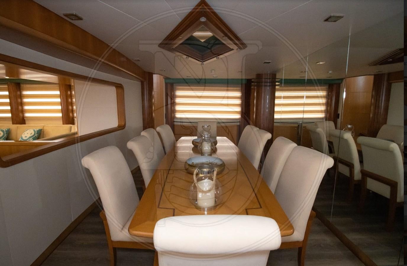 a dining room with a table aboard ANGELE Yacht for Sale