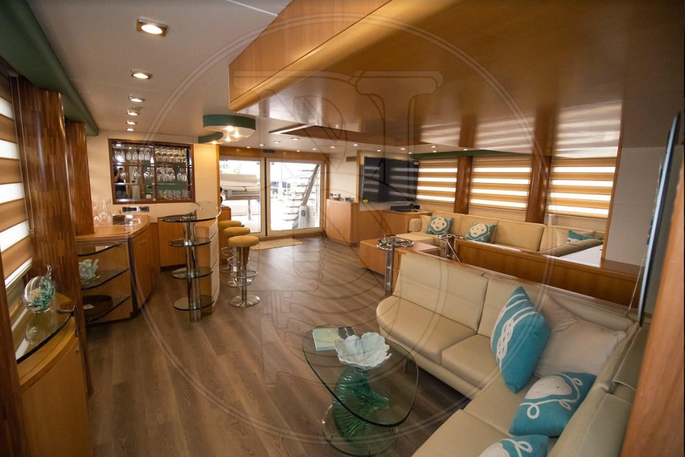 a living room with a wood floor aboard ANGELE Yacht for Sale