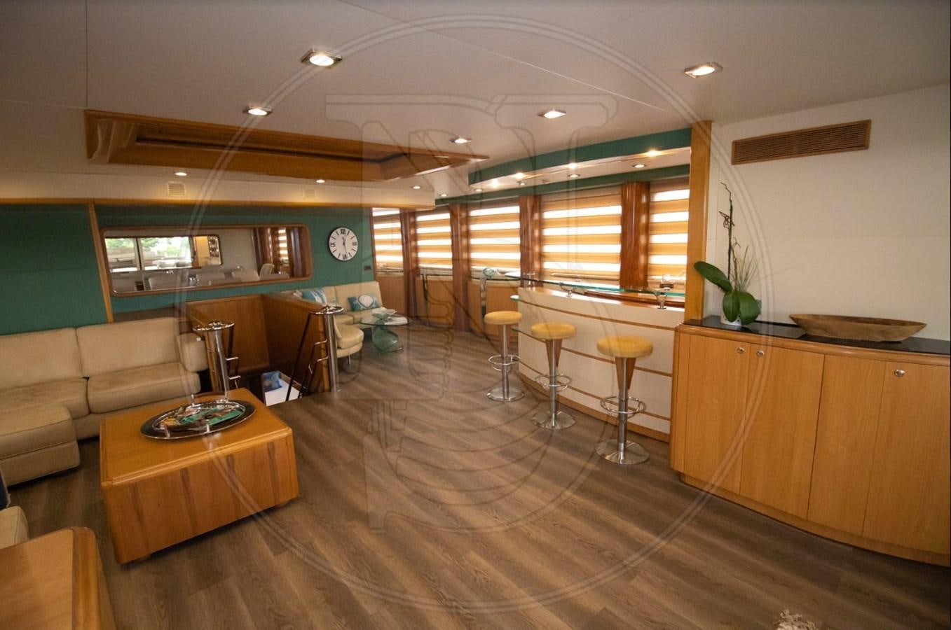 a room with a couch and a table and a tv aboard ANGELE Yacht for Sale
