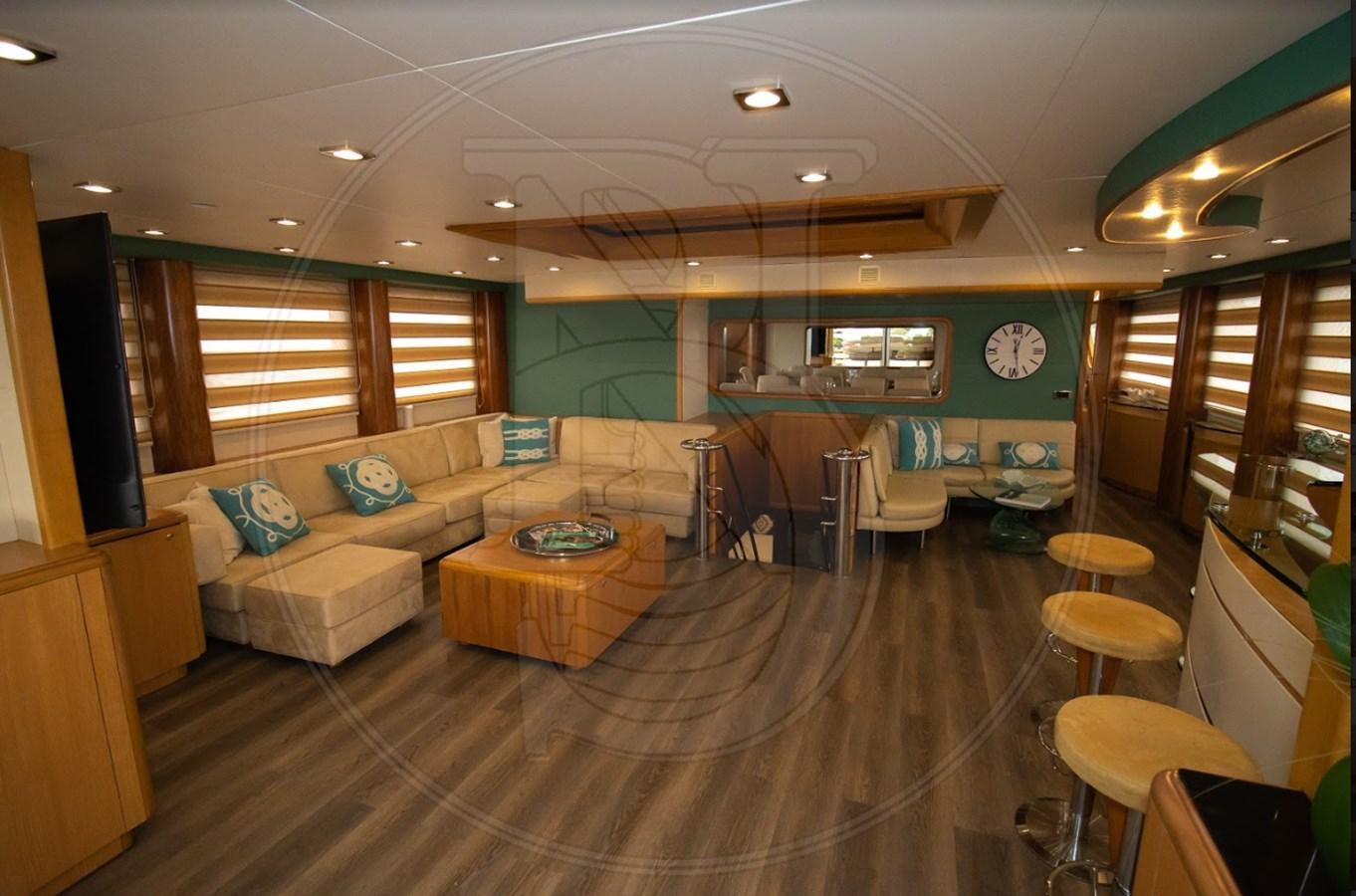 a living room with a wood floor aboard ANGELE Yacht for Sale
