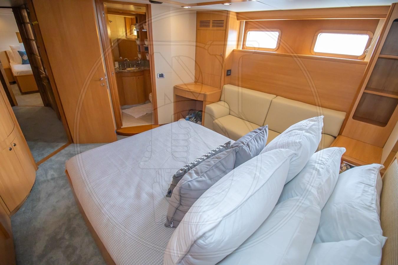 a bed in a room aboard ANGELE Yacht for Sale
