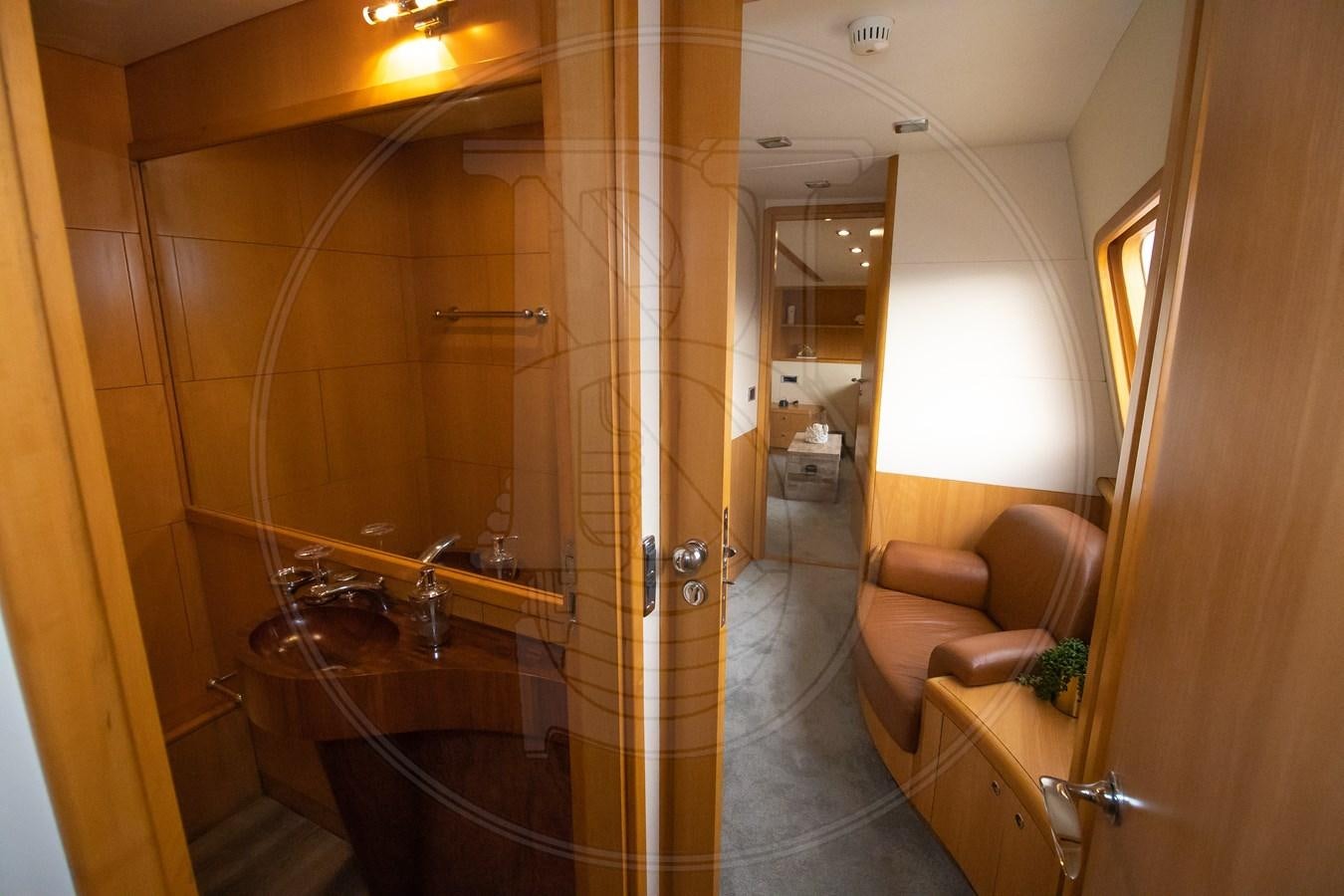 a bathroom with a glass shower aboard ANGELE Yacht for Sale