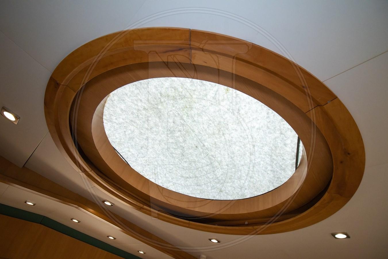 a round ceiling with a round glass ceiling aboard ANGELE Yacht for Sale