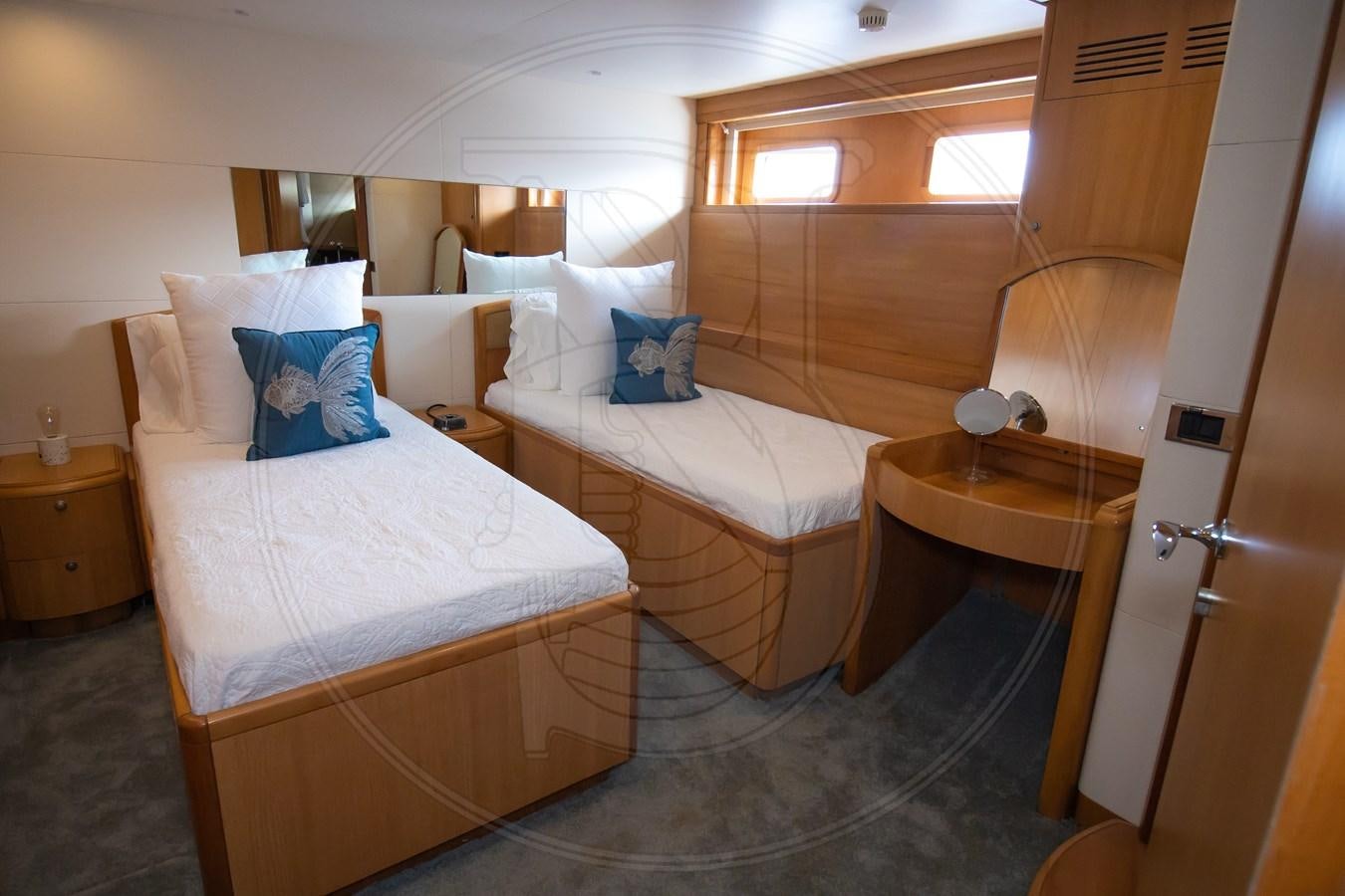 a couple of beds in a room aboard ANGELE Yacht for Sale