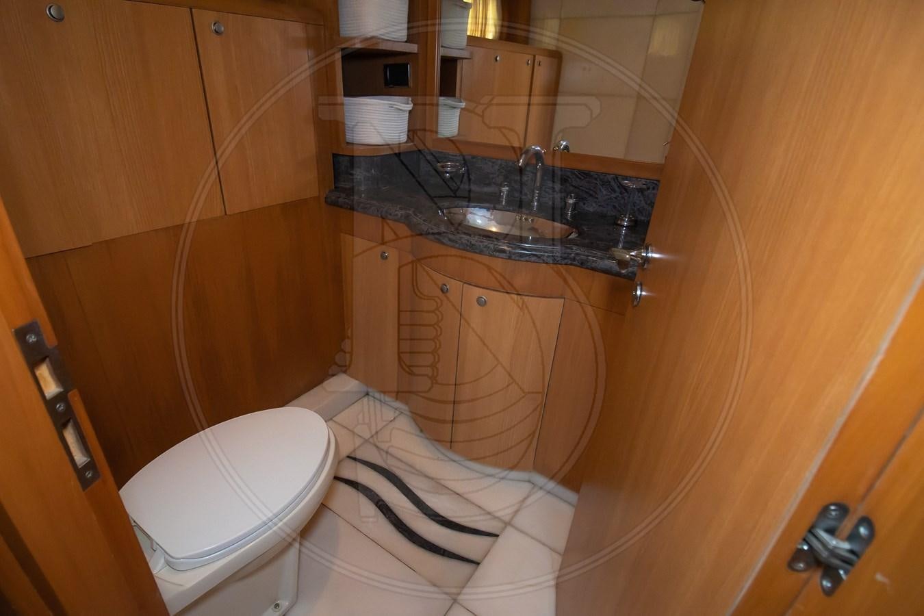 a bathroom with a sink and toilet aboard ANGELE Yacht for Sale