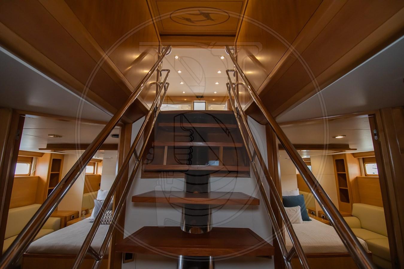 a large room with wooden floors aboard ANGELE Yacht for Sale