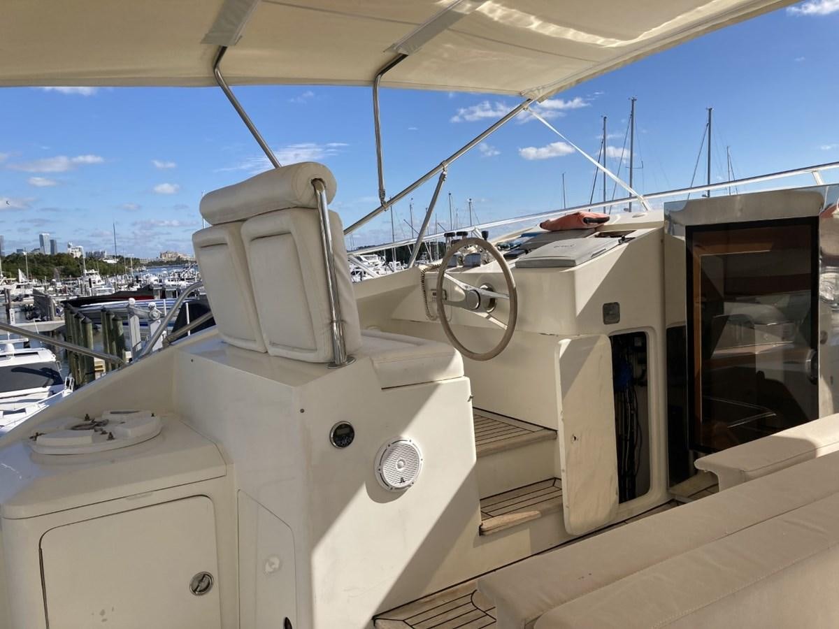 a large white machine on a deck aboard ANGELE Yacht for Sale