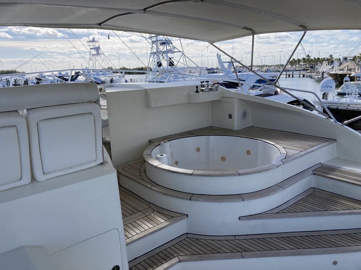 a large white boat in a large body of water aboard ANGELE Yacht for Sale