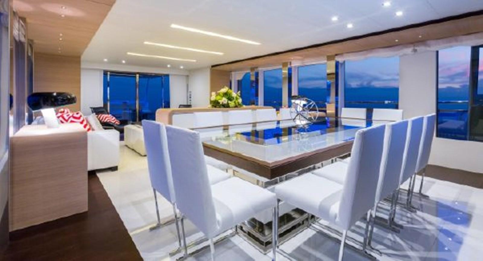 a room with a table chairs and a couch aboard 2021 ASTONDOA 100 CENTURY Yacht for Sale