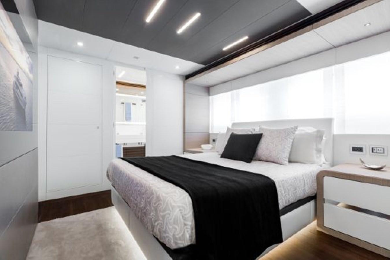 a bed in a room aboard 2021 ASTONDOA 100 CENTURY Yacht for Sale