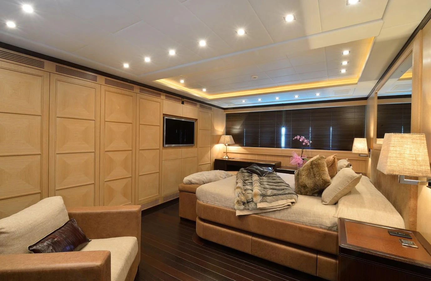 a large modern looking living room aboard MANGUSTA 108 - BECOOL - CAREFULLY USED Yacht for Sale
