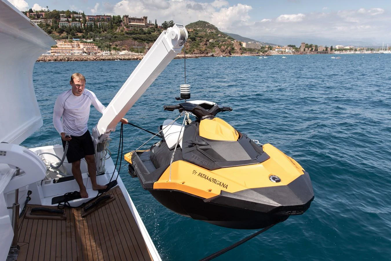 a person standing on a boat aboard FATAMORGANA Yacht for Sale
