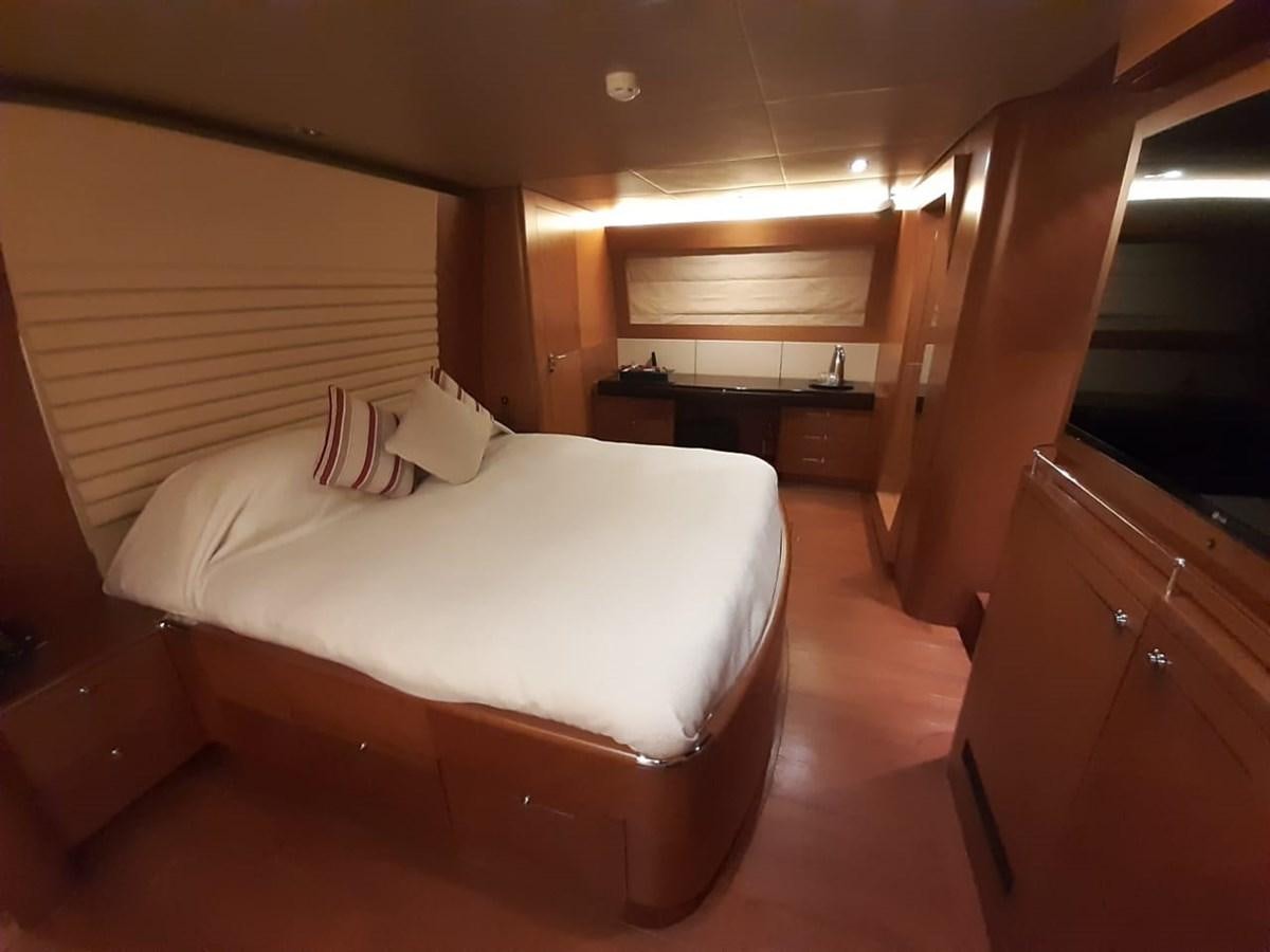a bed in a room aboard CYRUS YACHT 108 Yacht for Sale