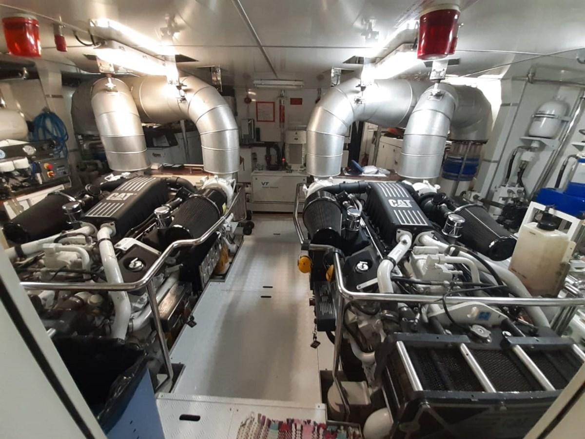 a room with machinery and lights aboard CYRUS YACHT 108 Yacht for Sale