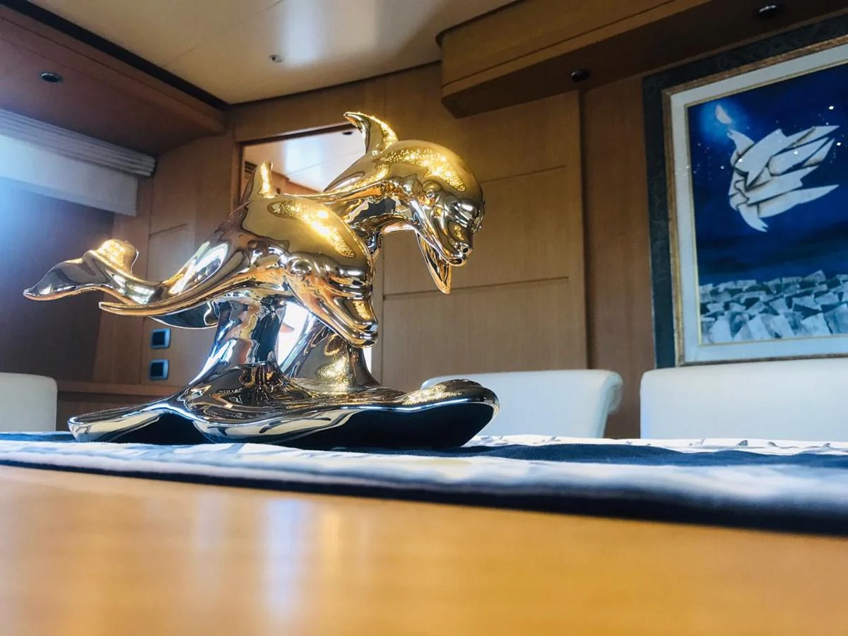 a trophy on a table aboard FIFTH AVENUE Yacht for Sale