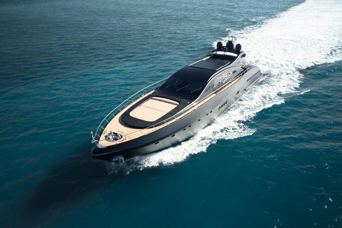 a boat on the water aboard MANGUSTA 108 Yacht for Sale