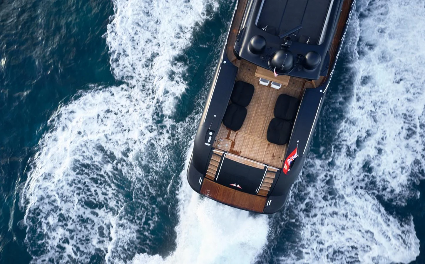 a boat in the water aboard MANGUSTA 108 Yacht for Sale