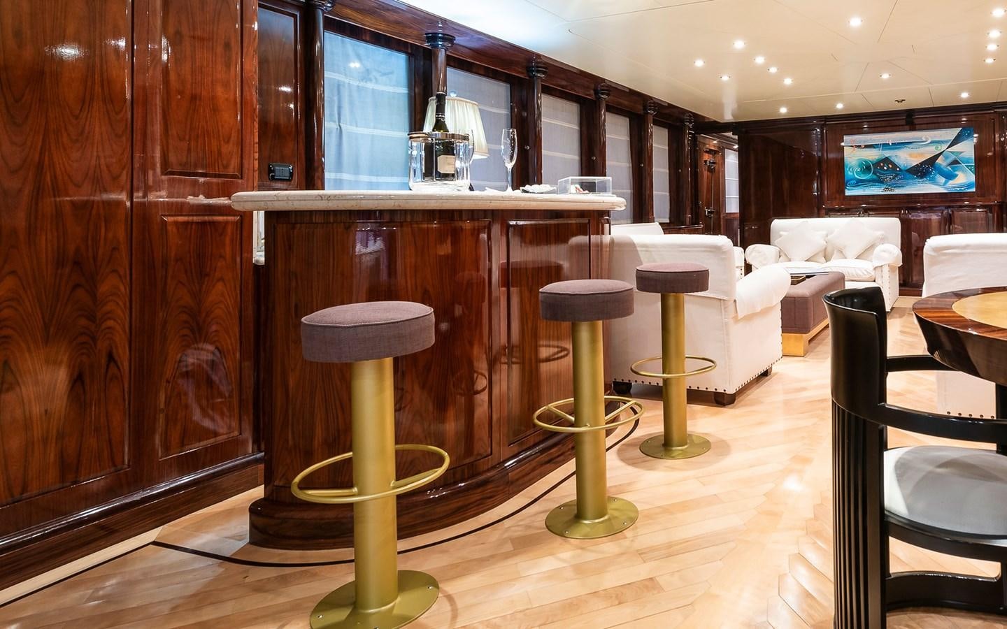 a bar stool in a room aboard BLUE MAGIC Yacht for Sale