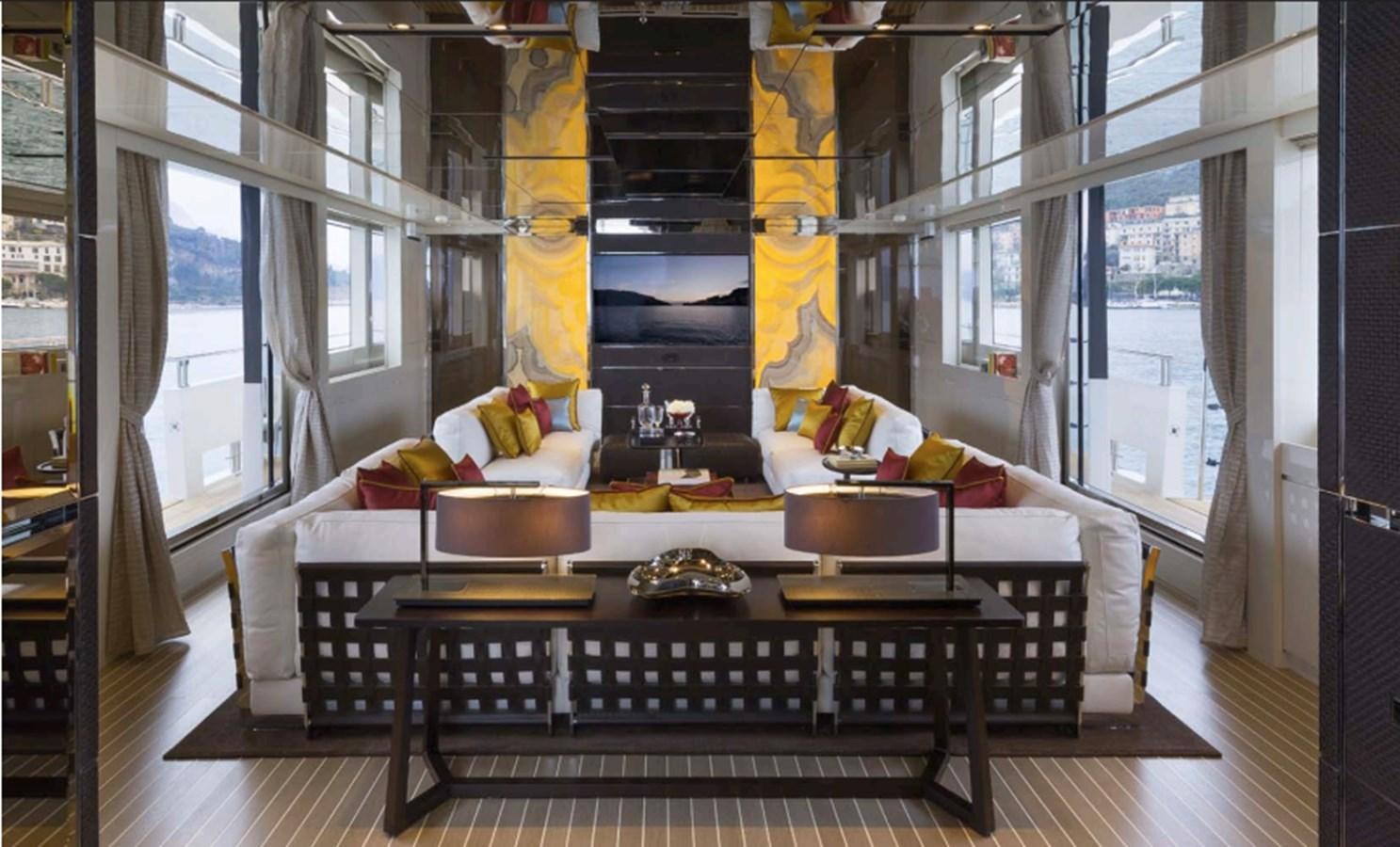 a living room with a table and chairs aboard SALT Yacht for Charter