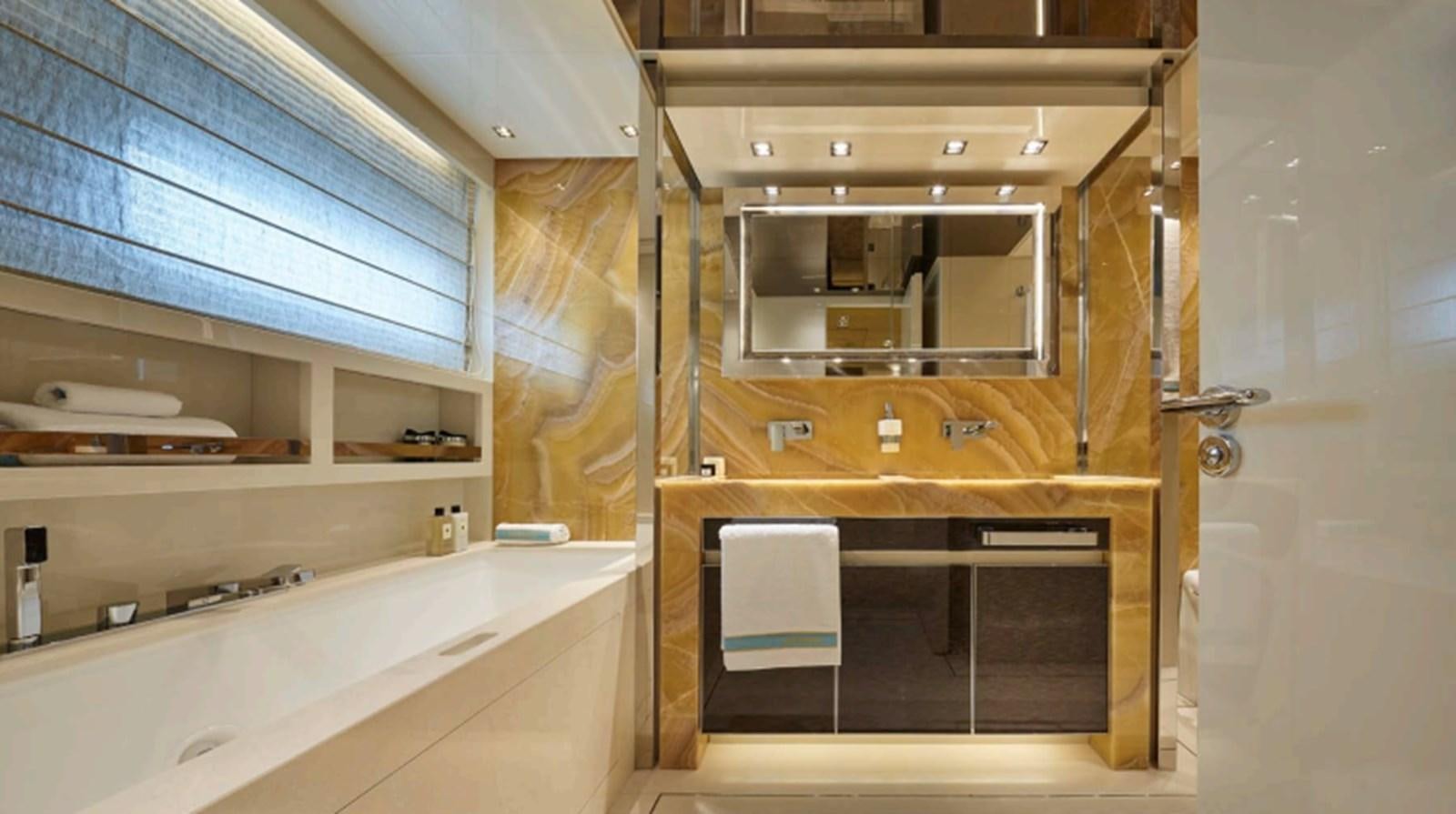 a kitchen with a sink and cabinets aboard SALT Yacht for Charter