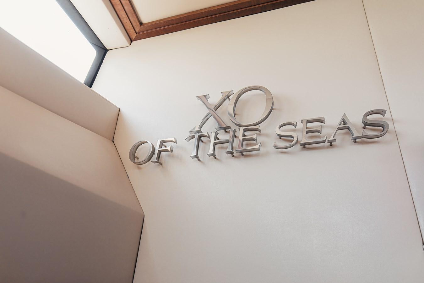 a box with a pair of scissors aboard XO OF THE SEAS Yacht for Sale