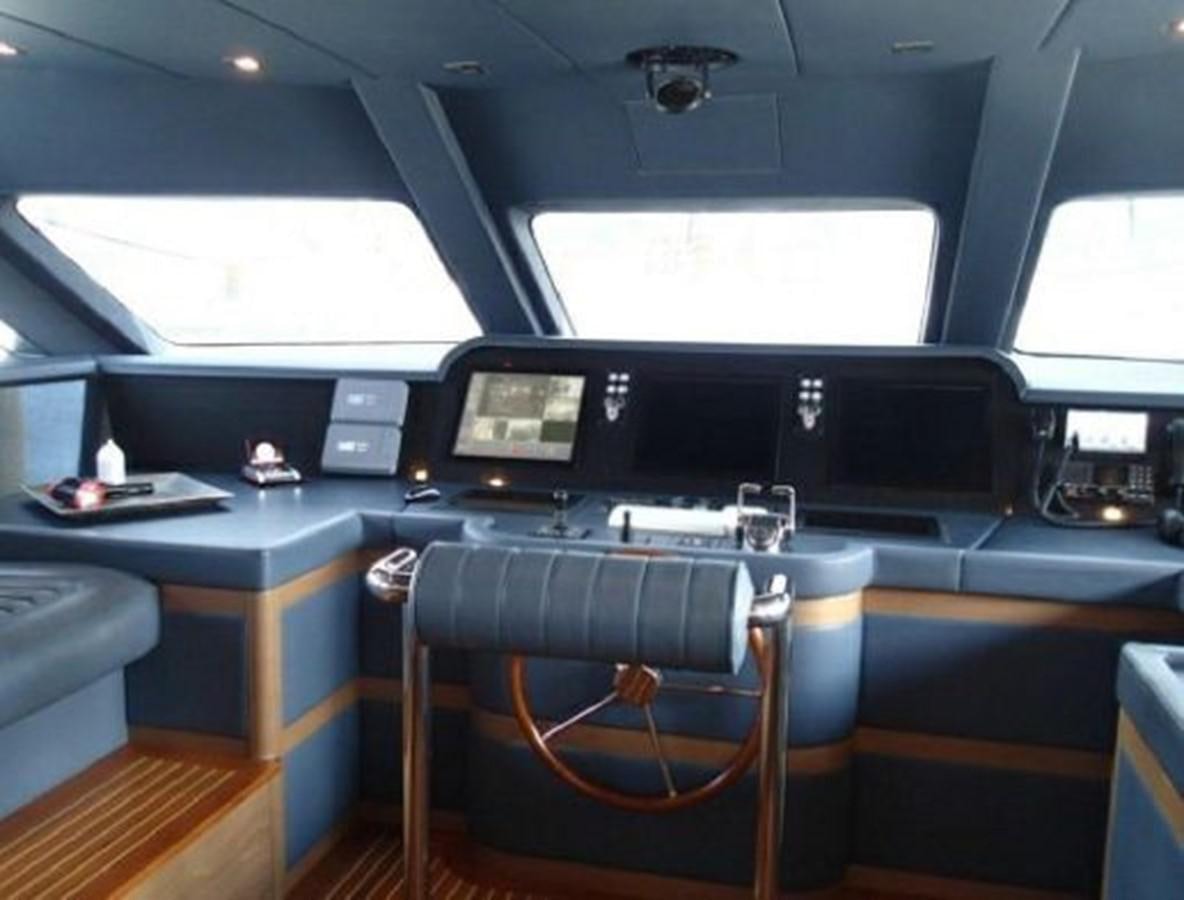 a room with a desk and computer aboard SERENDIPITY Yacht for Sale