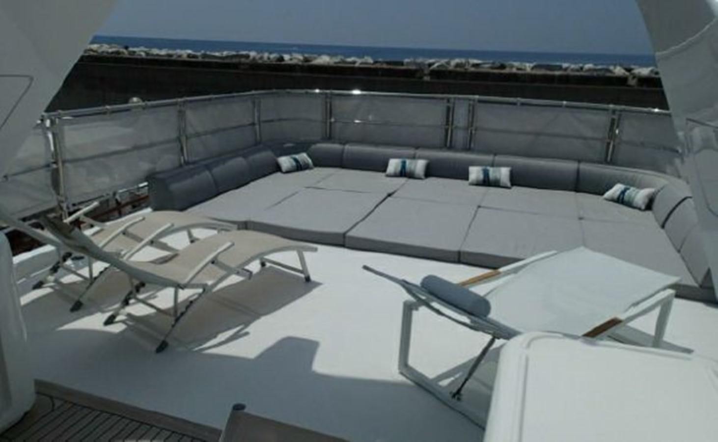 a large room with a balcony aboard SERENDIPITY Yacht for Sale