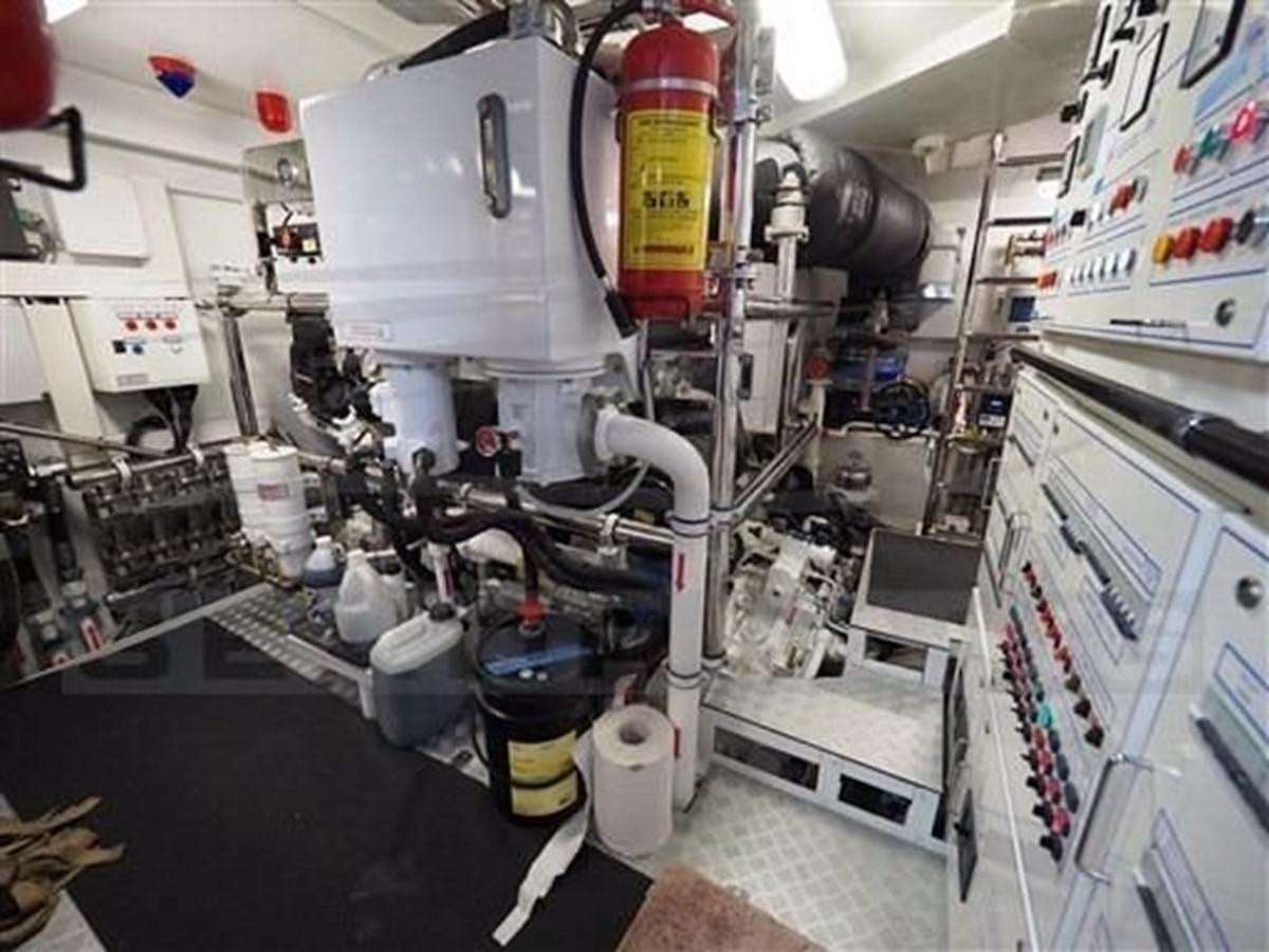 a room with a large machine aboard SERENDIPITY Yacht for Sale