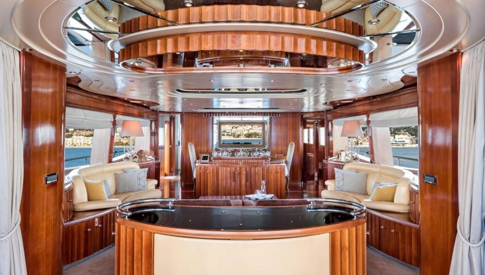 a kitchen with a large island aboard NAUGHTY BY NATURE Yacht for Sale