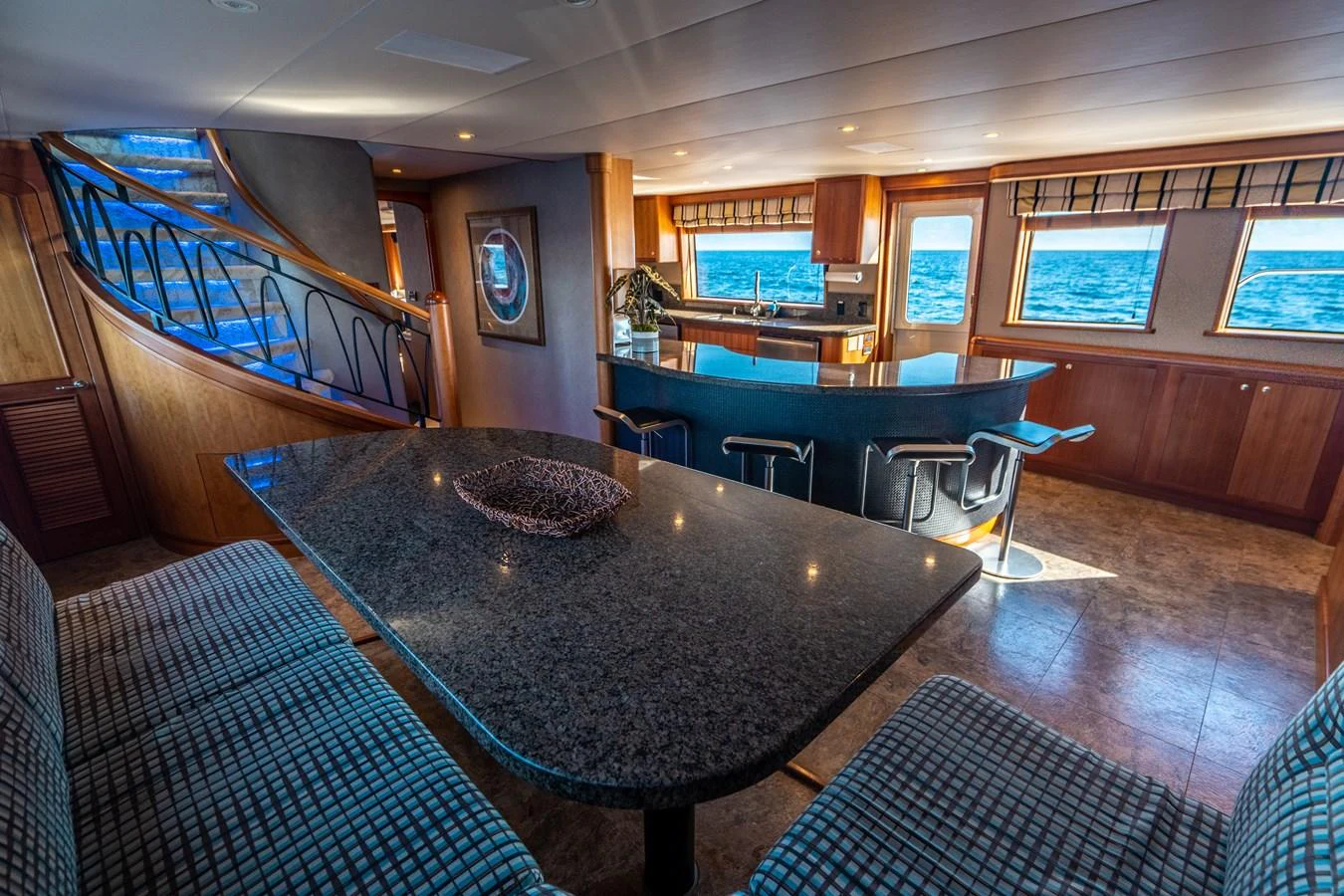 a large kitchen with a pool table aboard FREE SPIRIT Yacht for Sale