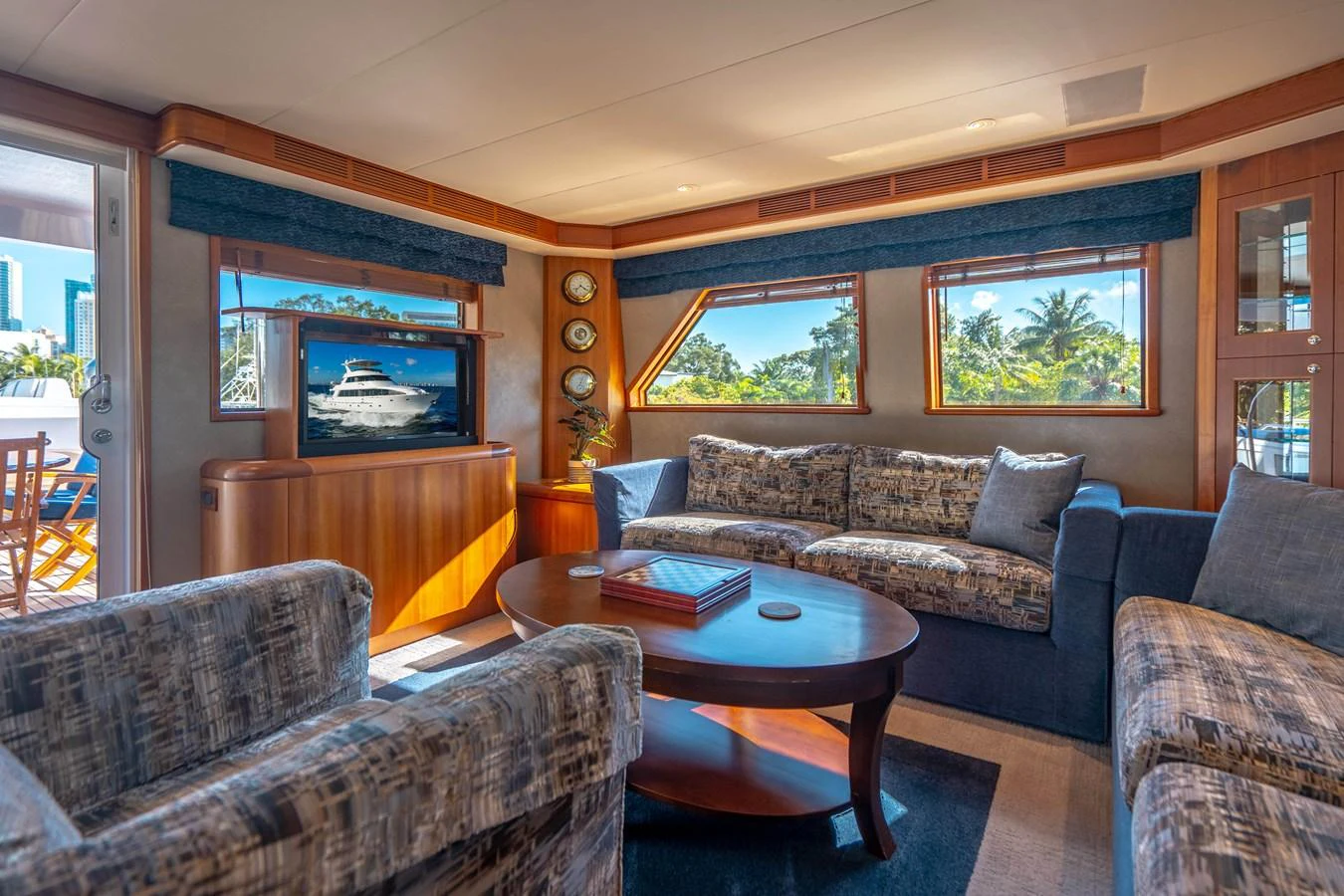 a living room with a fireplace aboard FREE SPIRIT Yacht for Sale