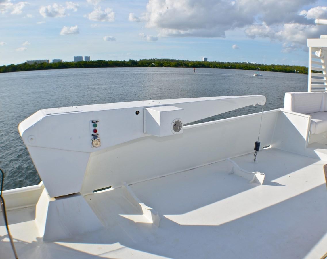 a white boat on a beach aboard ISABELLA Yacht for Sale