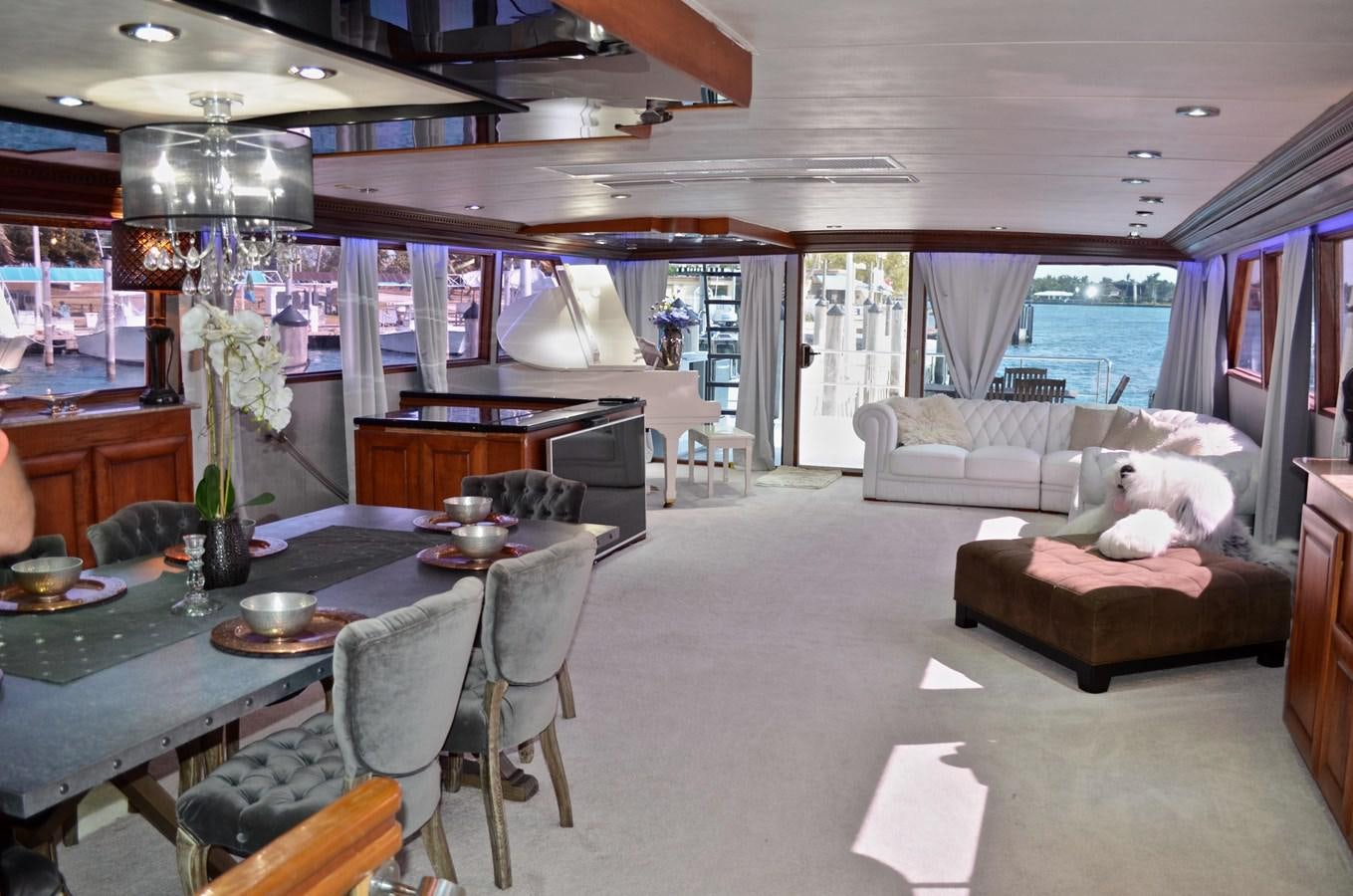 a living room with a couch and a table aboard ISABELLA Yacht for Sale