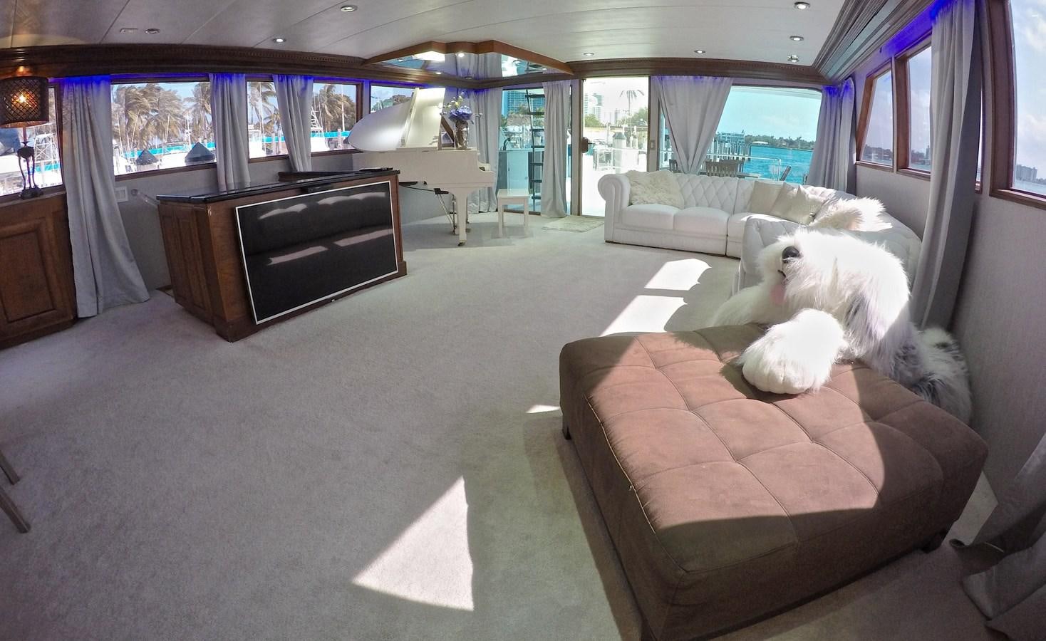 a dog sitting on a couch aboard ISABELLA Yacht for Sale