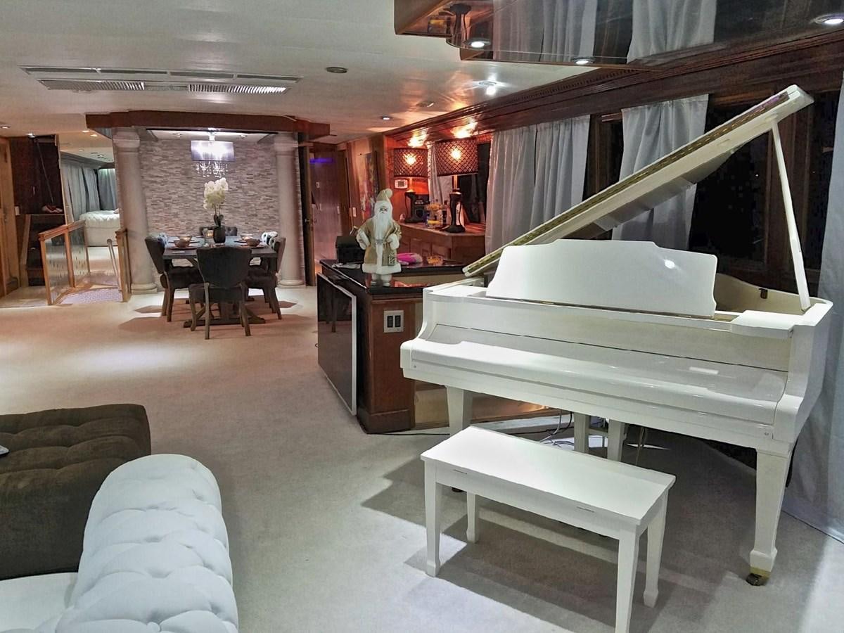 a room with a bed and a desk aboard ISABELLA Yacht for Sale