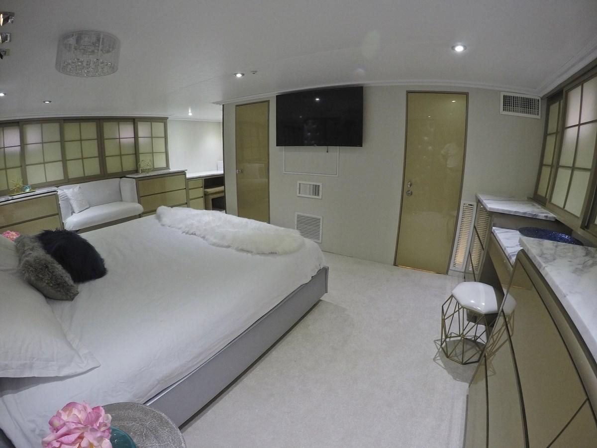 a room with a bed and a tv aboard ISABELLA Yacht for Sale