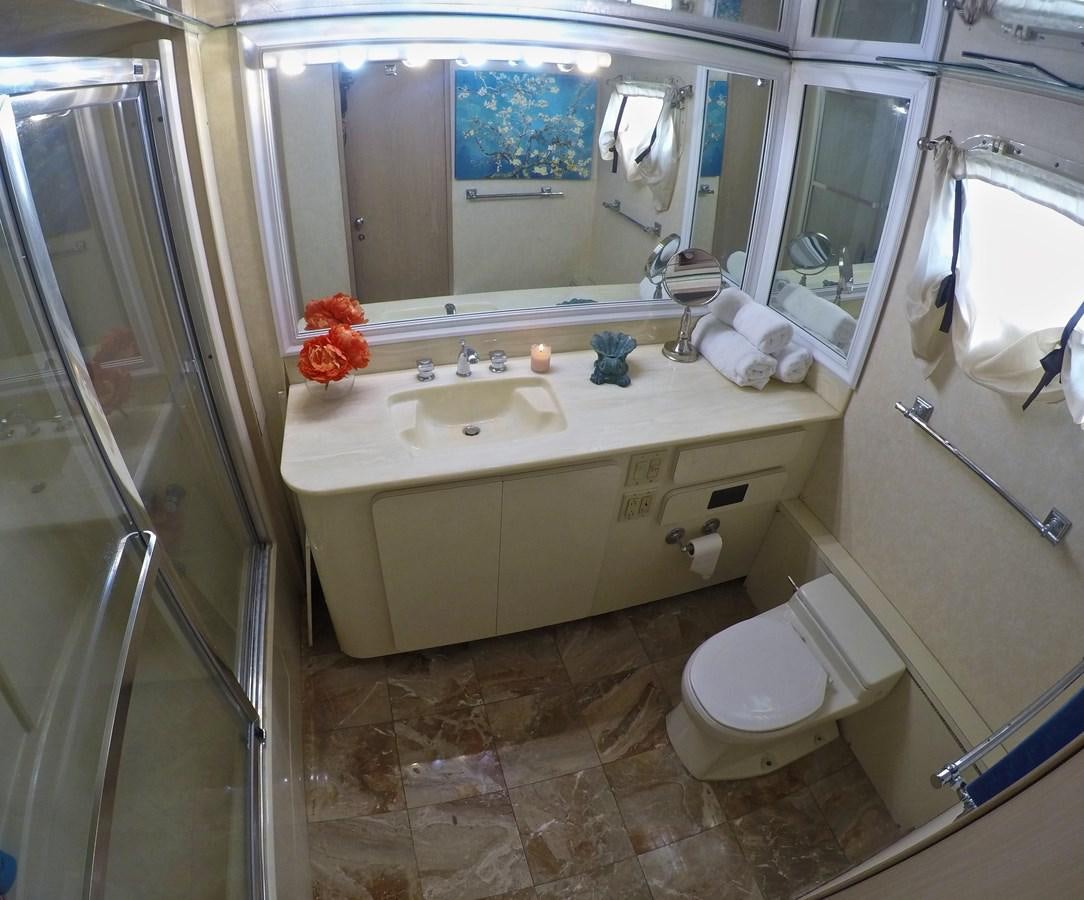 a bathroom with a sink toilet and bathtub aboard ISABELLA Yacht for Sale