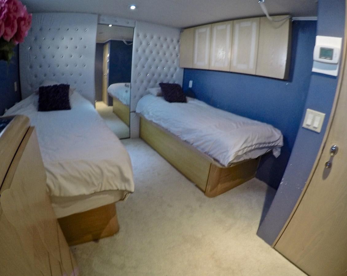 a room with several beds aboard ISABELLA Yacht for Sale