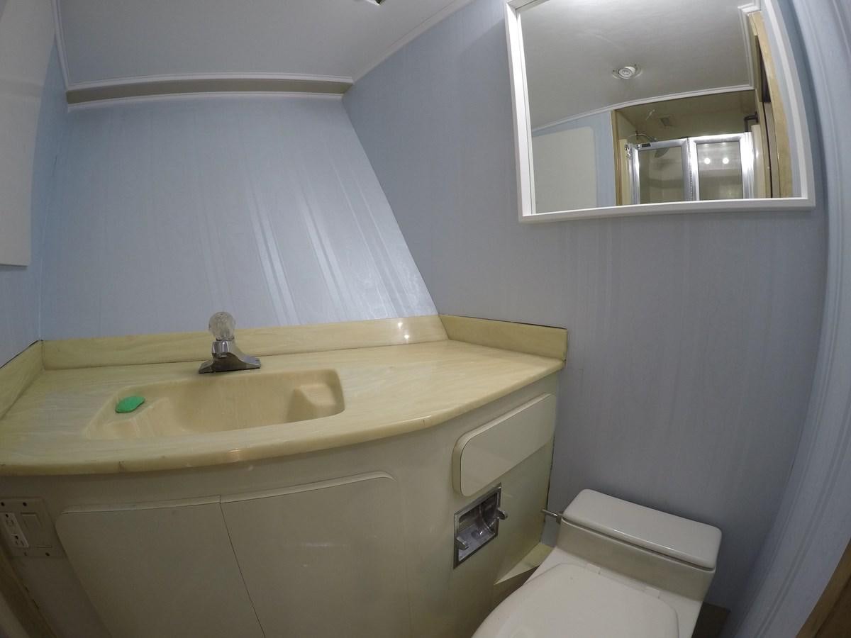 a bathroom with a sink and a toilet aboard ISABELLA Yacht for Sale