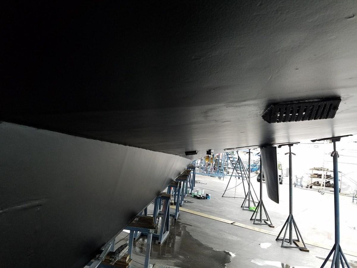 a large room with a large white wall and a black ceiling aboard ISABELLA Yacht for Sale