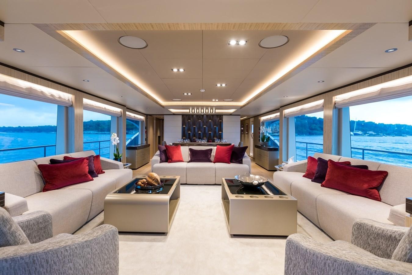 a living room with a large window aboard LEGACY Yacht for Sale