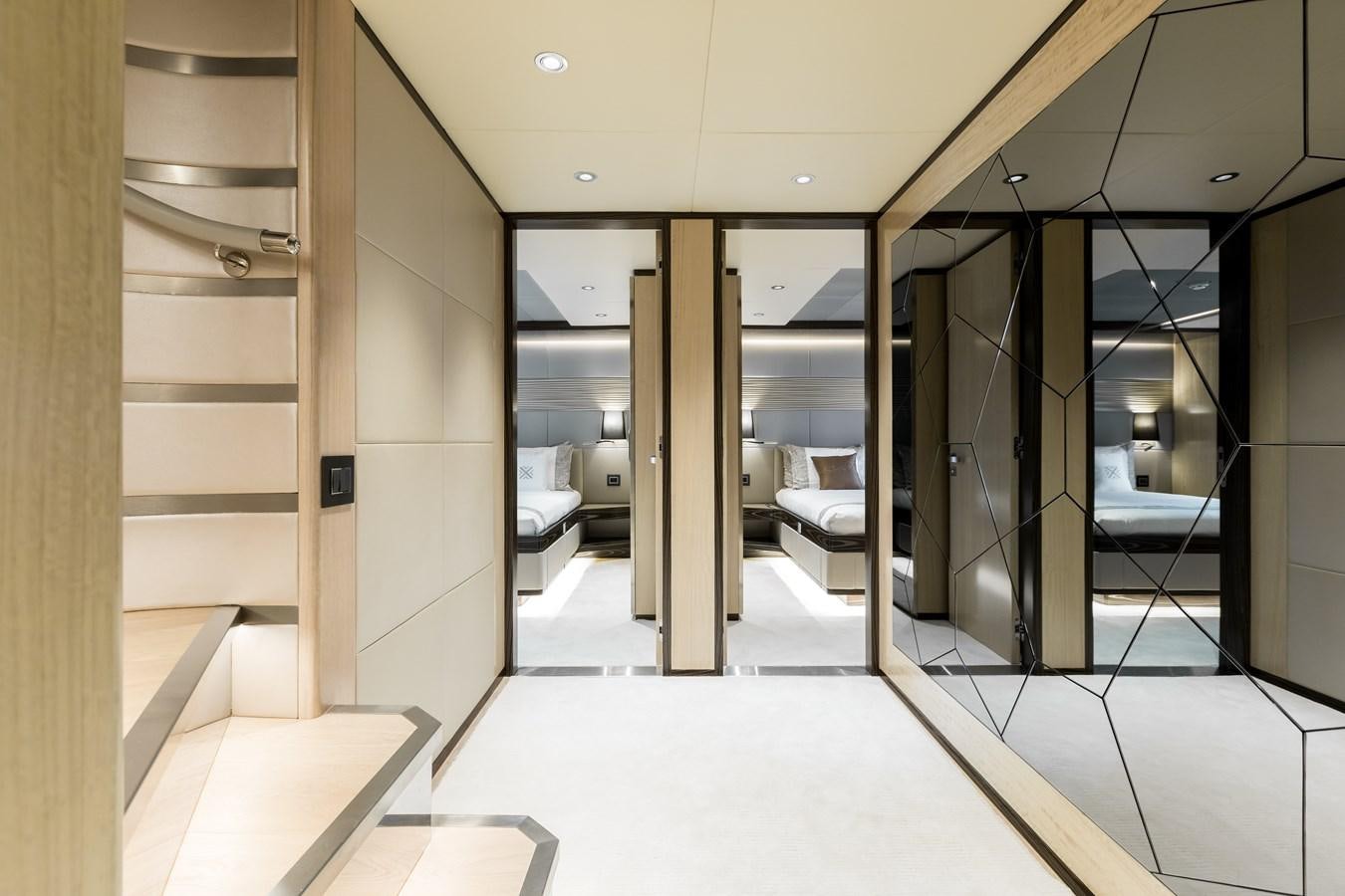 a room with a glass door and a white floor aboard LEGACY Yacht for Sale